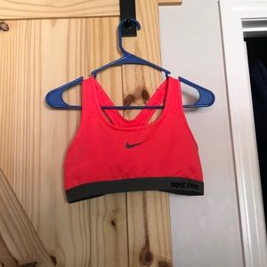 Neon pink size M Nike sports bra